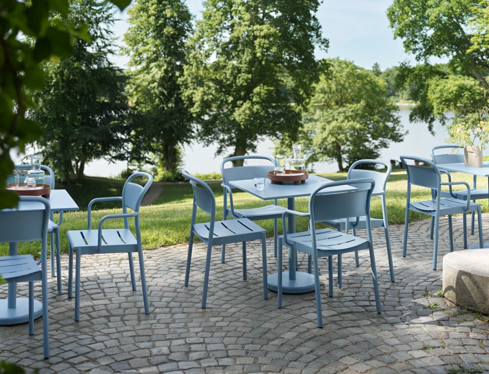 linear-steel-cafe-table-73-armchair-side-chair-pale-blue-raise-carafe-glass-platform-tray-muuto-org