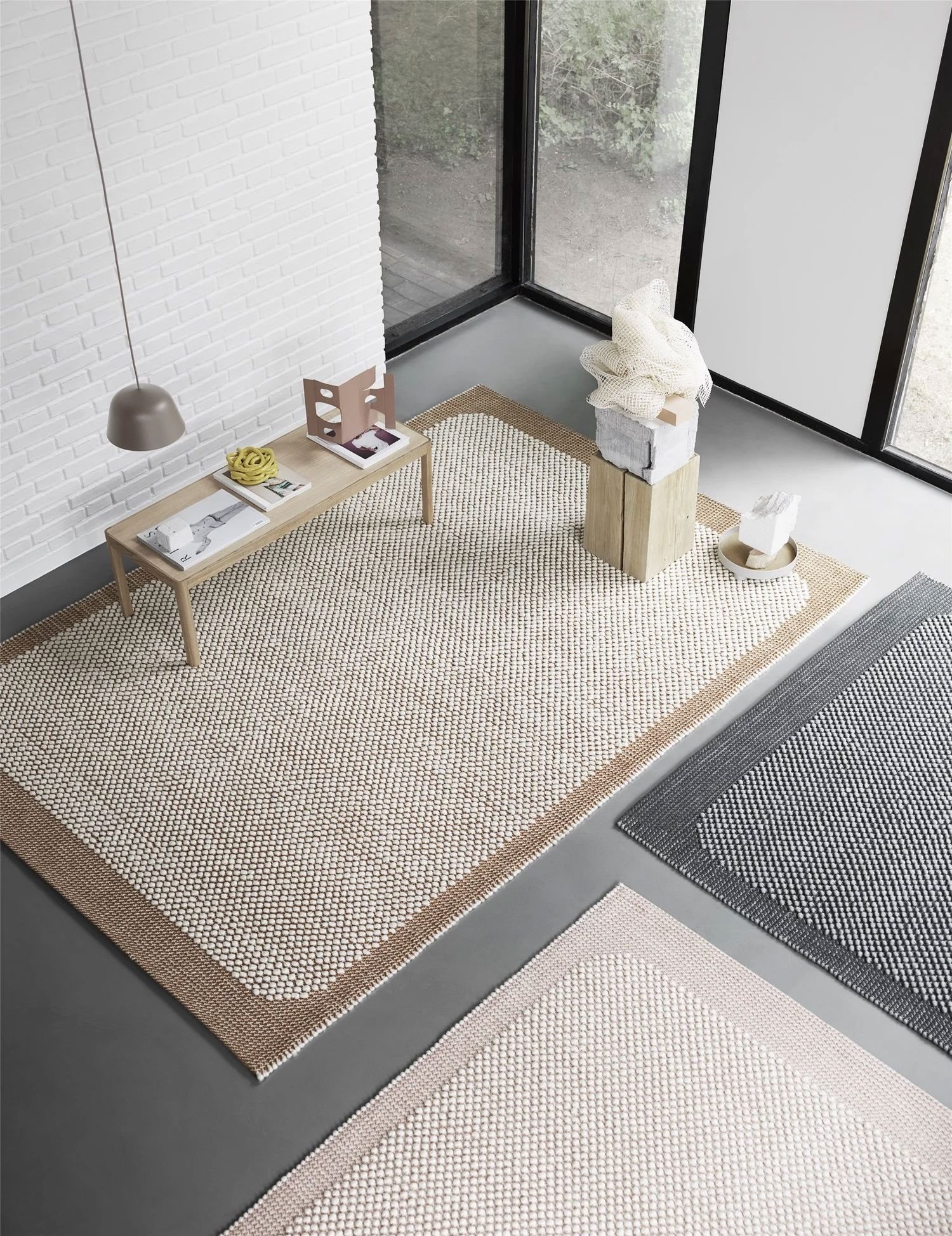 /cdn-cgi/image/width=1500,quality=85,format=auto/globalassets/content-media/images/stories/a-sensuous-design-pebble-rug/pebble-pr-workshop-table-ambit-o25-taupe-muuto-org_150_optimized.jpg