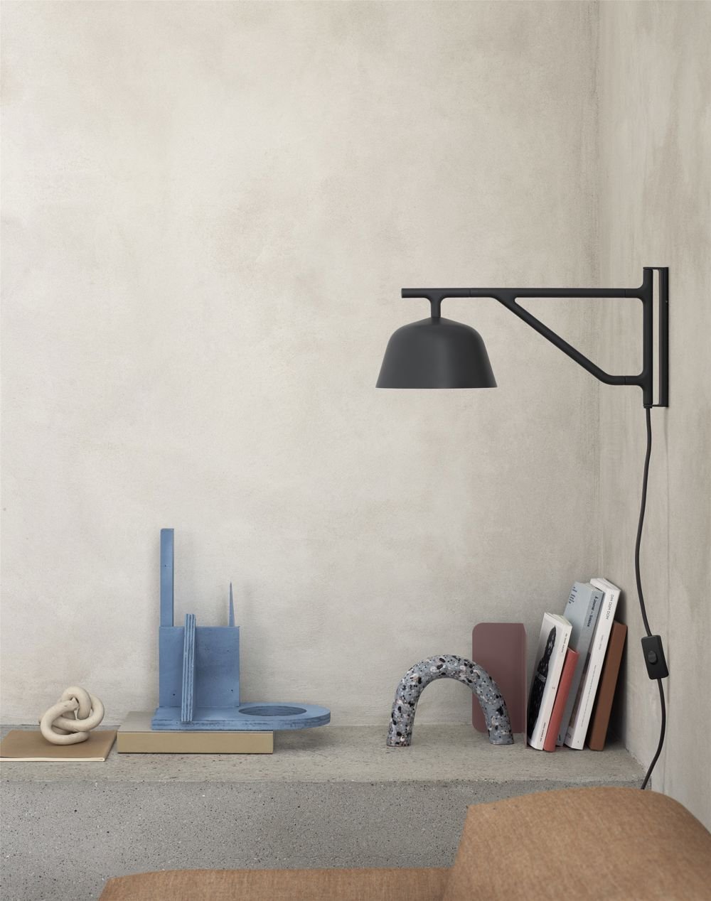 /cdn-cgi/image/width=1500,quality=85,format=auto/globalassets/content-media/images/stories/timelessly-contemporary-ambit-lamp-series/ambit-wall-lamp-black-connect-sofa-remix-252-compile-bookend-muuto-org_150.jpg