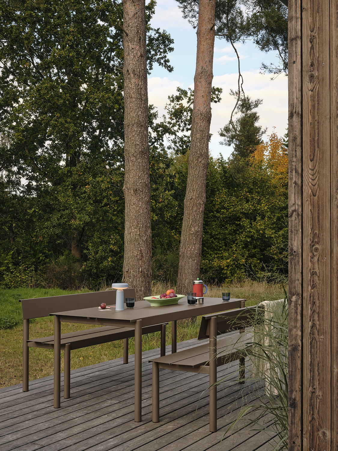 /globalassets/content-media/images/01.-lifestyle-images/january-26/linear-steel-bench-w-backrest-170-taupe-table-200-taupe-ease-portable-lamp-light-blue-mere-raise-low-res.jpg?revision=639114102290000000