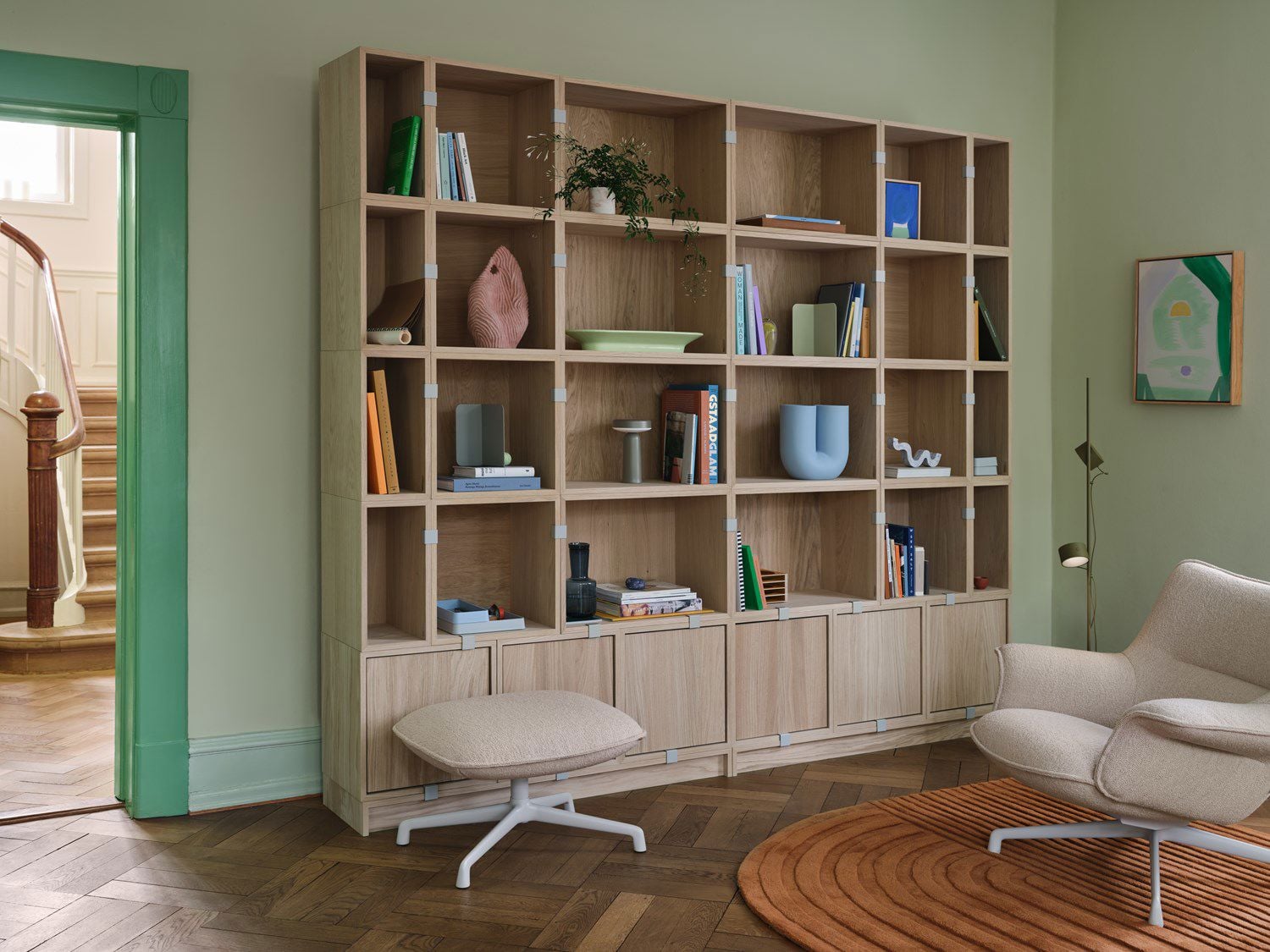 /globalassets/content-media/images/designer/julien-de-smedt/stacked-bookcase-1-oak-doze-lounge-chair-low-back-ottoman-swivel-hearth-7-grey-relevo-burnt-orange-post-brown-green-muuto-org.jpeg?revision=639063157770000000