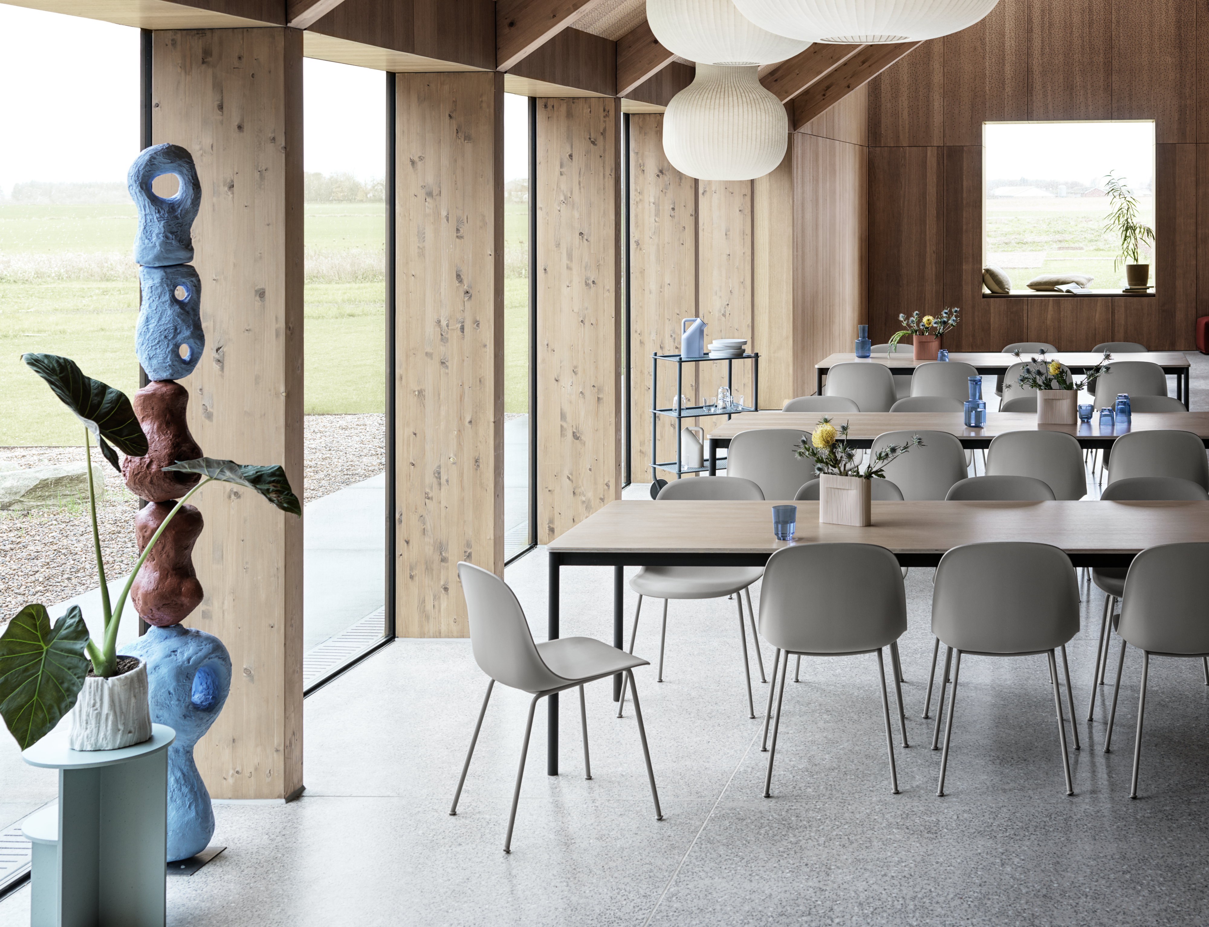 Fiber Side Chair in Grey - Base Table 250x90 in Oak Veneer - Strand Pendant Lamp - Ridge Vase H16,5 - Raise in Dark Blue - Halves Side Table - Flow Trolley