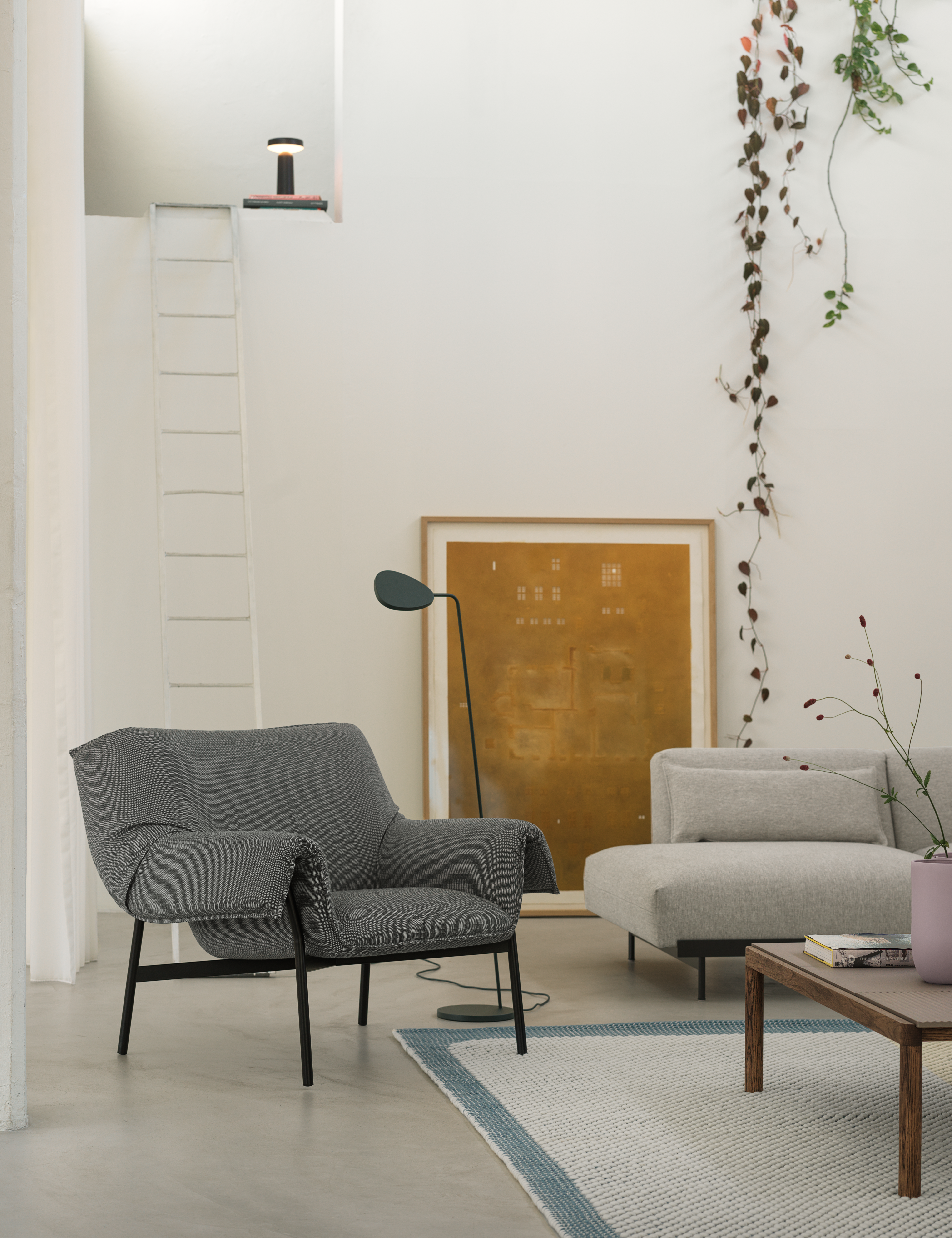 Wrap Lounge Chair in Sabi 151/Black, In Situ Modular Sofa in Clay 12, Pebble Rug in Pale Blue, Couple Coffee Table 1 Wavy 2 Plain in Taupe/Dark Oiled Oak, Ease Portable Lamp in Black, Leaf Floor Lamp in Dark Green, Kink Vase in Dusty Lilac