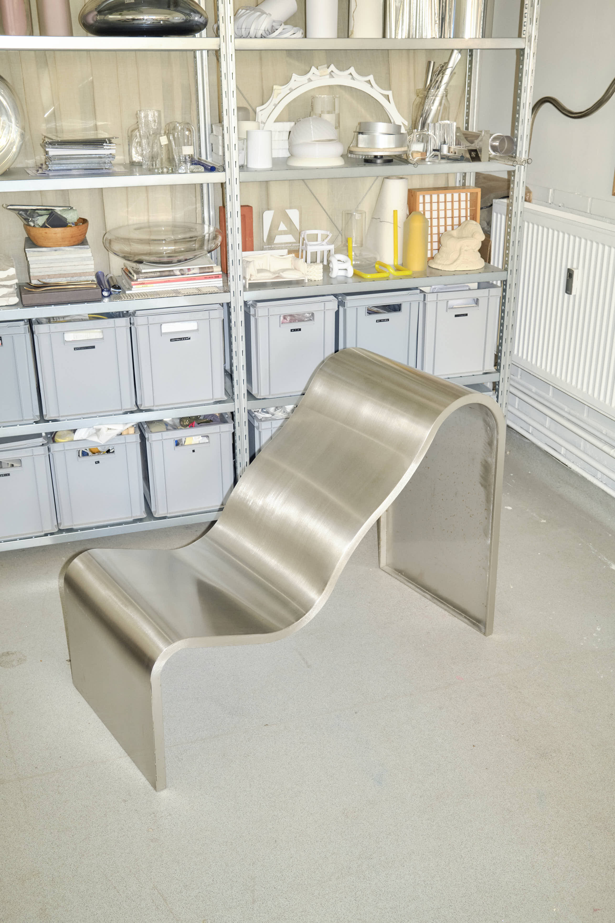The Dream View Bench by Lise Vester positioned in her studio, highlighting its sculptural shape in a thoughtful workspace.