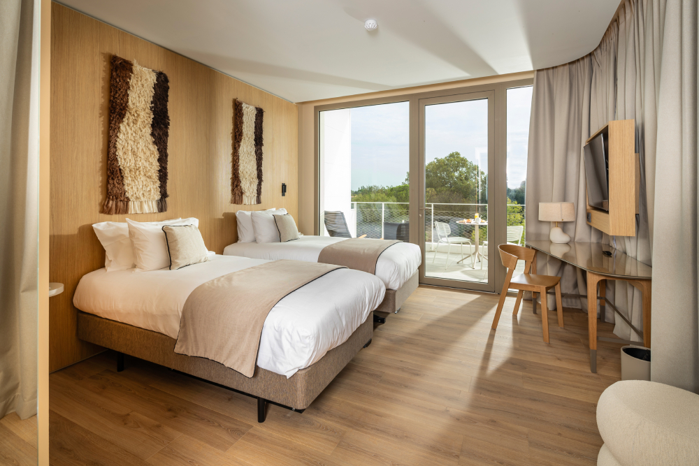 Interior view of Horizon Resort Massane in France featuring Muuto's Cover Side Chair, creating a modern and welcoming hotel atmosphere.