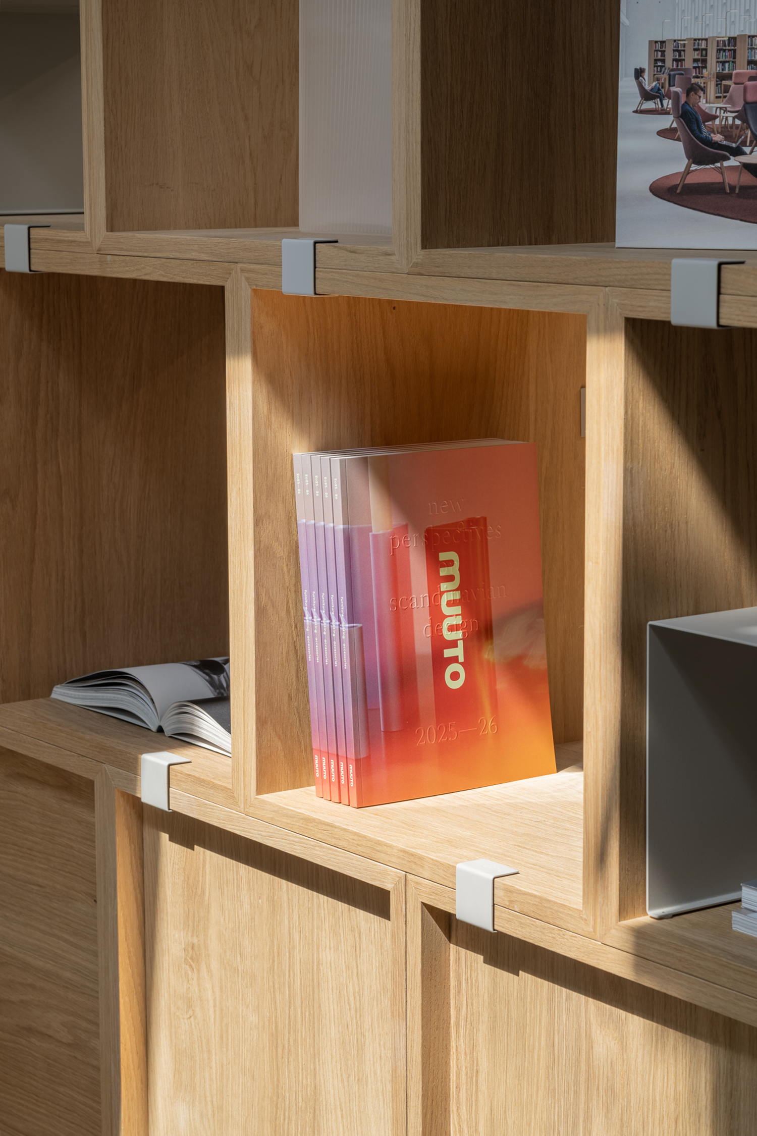 The Muuto brand publication 2025 placed in a bookshelf